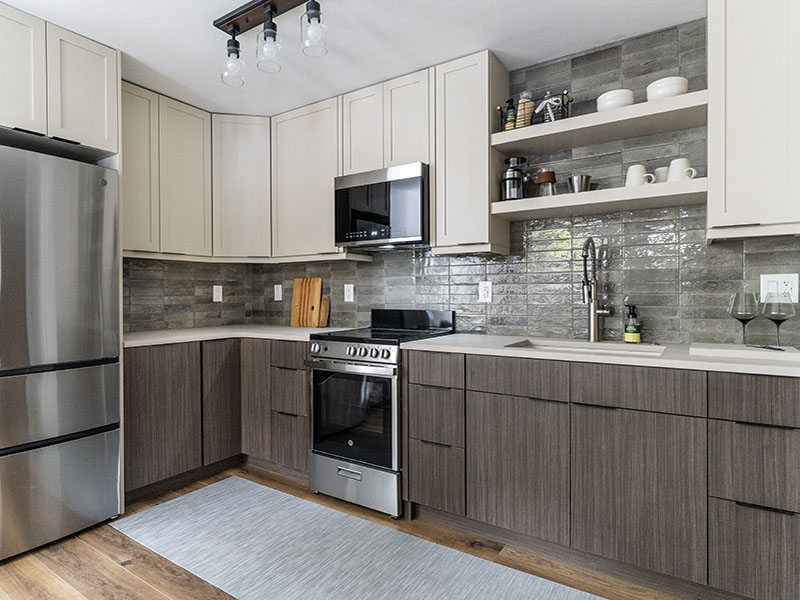 Complete Kitchen Remodel Featuring; Custom Two Tone Cabinets, Quartz Countertops, Tile Backsplash, Luxury Vinyl Floors